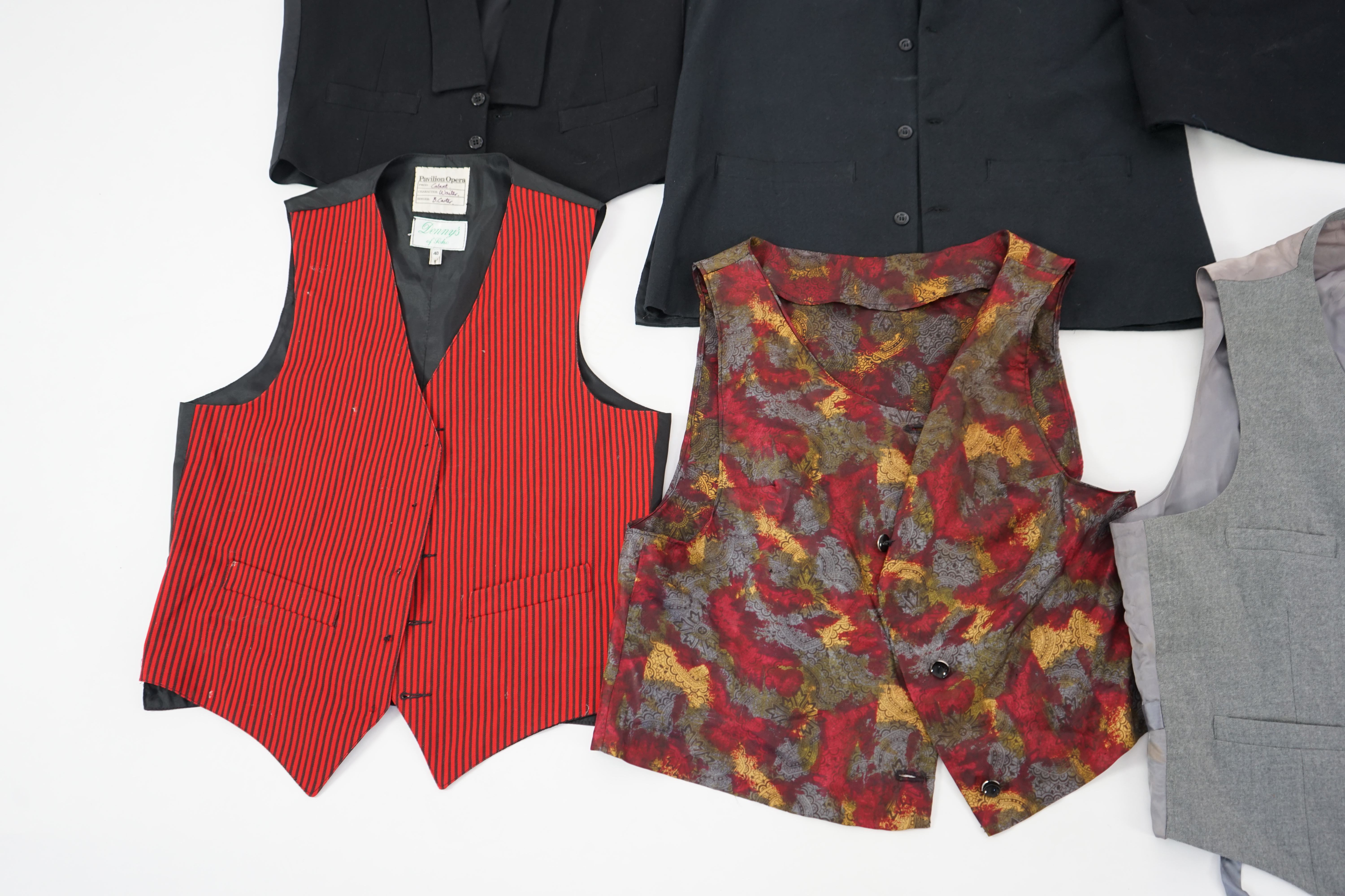 Five assorted men's period waistcoats (darker colours). Ex Pavilion Opera.